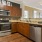 large, c-shaped kitchen with ample lighting