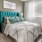 carpeted bedroom with large window