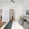 apartment bedroom with large closet and bright lighting