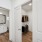 walk-in closet with built-in shelving and hanging space