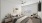 spacious apartment bedroom with ceiling fan