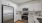 c-shaped kitchen with ample storage and modern finishes