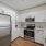 c-shaped kitchen with ample storage and modern finishes