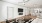 Apartment living room with ceiling fan and updated flooring