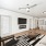 Apartment living room with ceiling fan and updated flooring