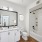 bathroom with granite countertops and updated fixtures