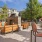double-sided fireplace on patio with chairs and tables