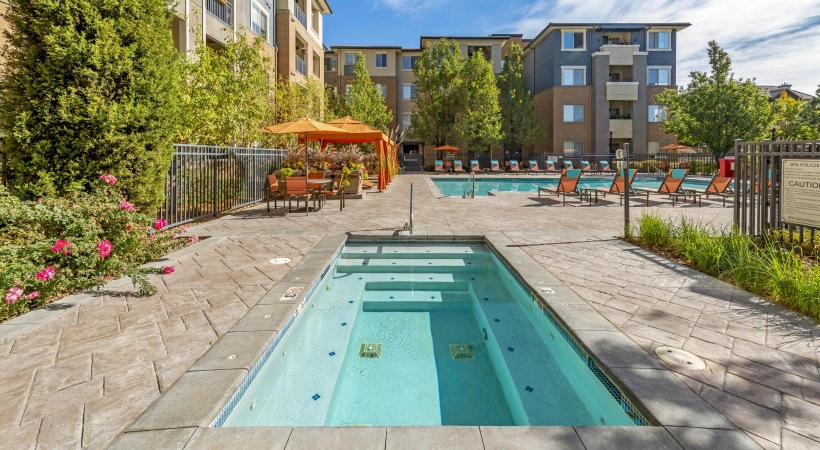 jacuzzi next to swimming pool